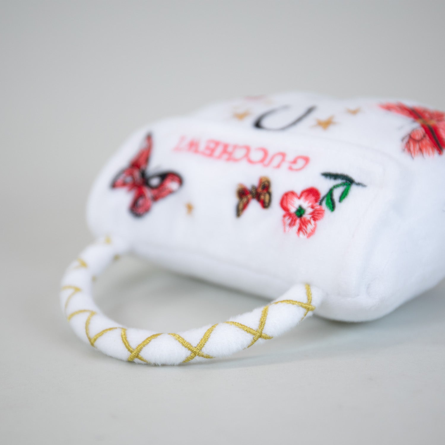 Gucchewi Butterfly Purse Toy