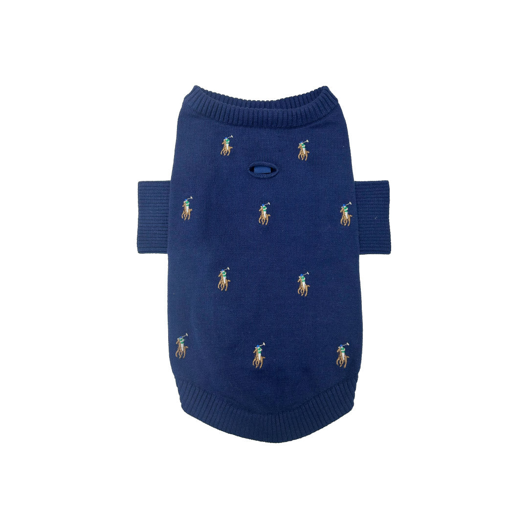 Navy blue dog sweater with embroidered designs on a white background