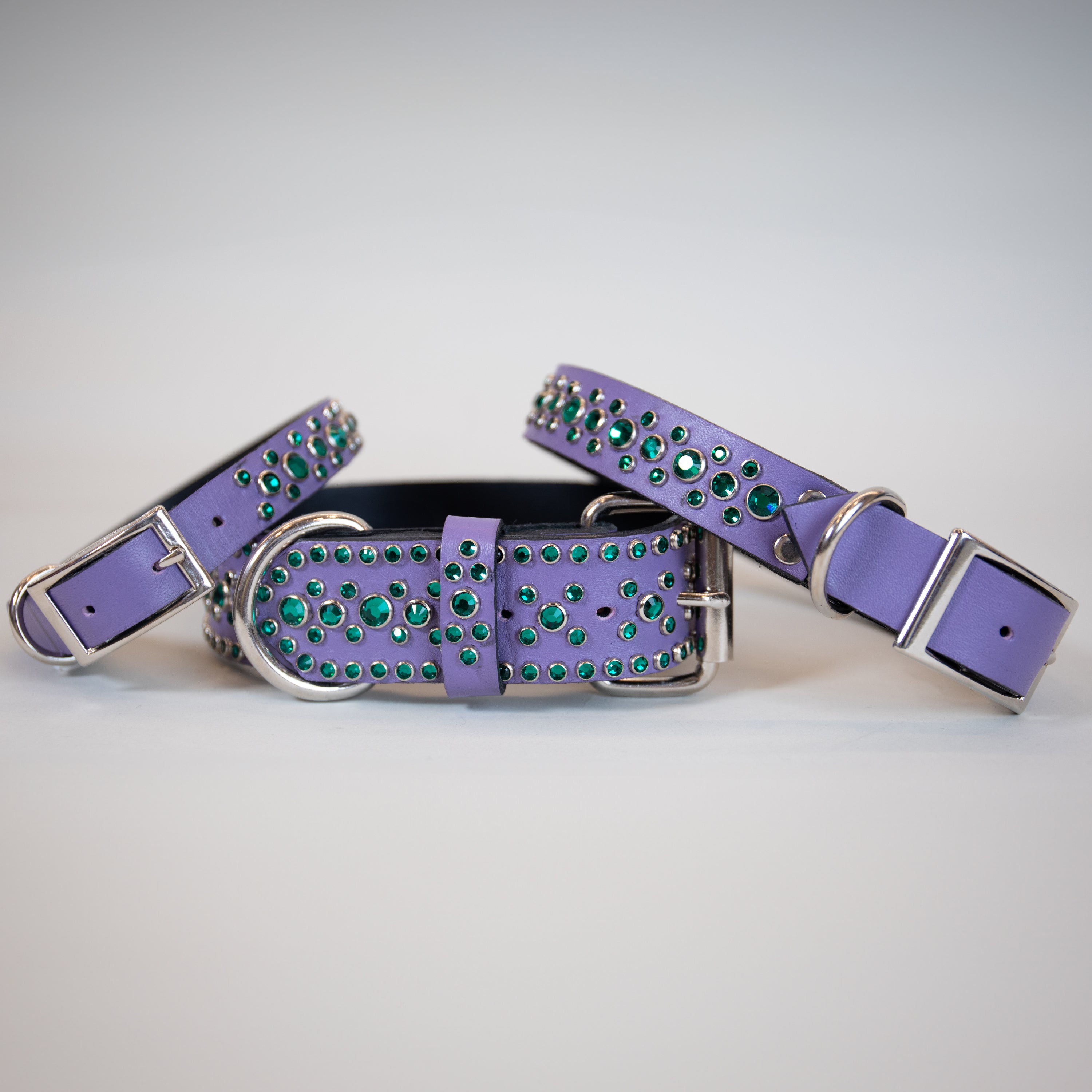 purple leather with green gems